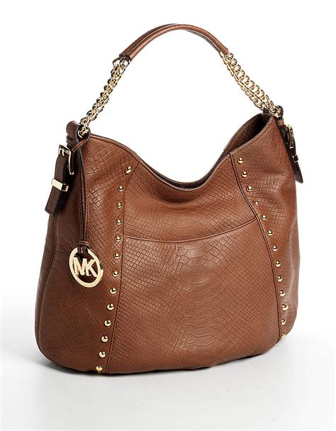 medium size michael kors purse|michael kors purse with pockets.